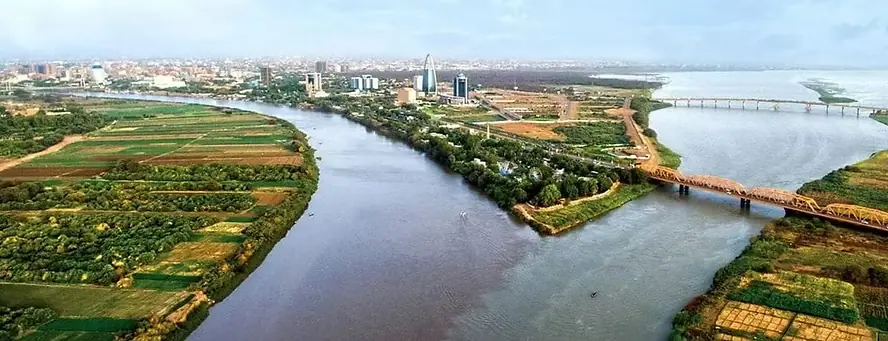 The confluence of the Blue Nile (left) and the wider White Nile (right).